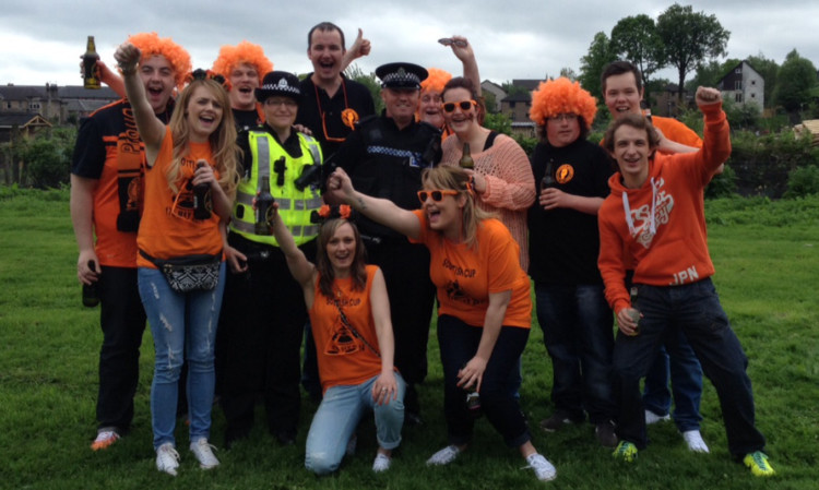 Police enjoying a lighter moment with Dundee United fans who stopped off at Stirling County Rugby Club on the way to Glasgow.