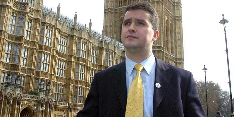 Scottish National Party MP Angus MacNeil stands outside the Houses of Parliament in London, Wednesday March 22, 2006. Mr MacNeil complained to Met Commissioner Sir Ian Blair and the Director of Public Prosecutions last week after it was revealed that several wealthy individuals had been nominated for peerages after giving Labour loans running into millions of pounds. See PA Story POLITIVS Honours. PRESS ASSOCIATION Photo. Photo credit should read: Michael Stephens/PA.