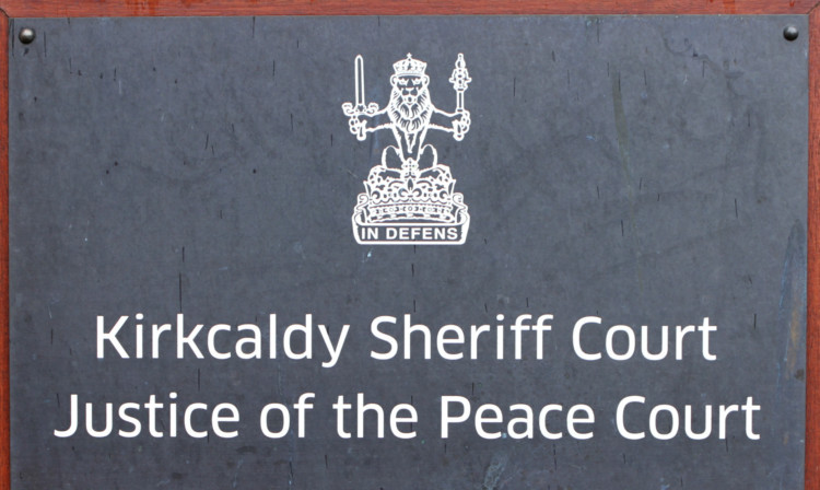 Kris Miller, Courier, 10/09/12. Picture today shows building exterior sign for Kirkcaldy Sheriff Court for story about possible closure.