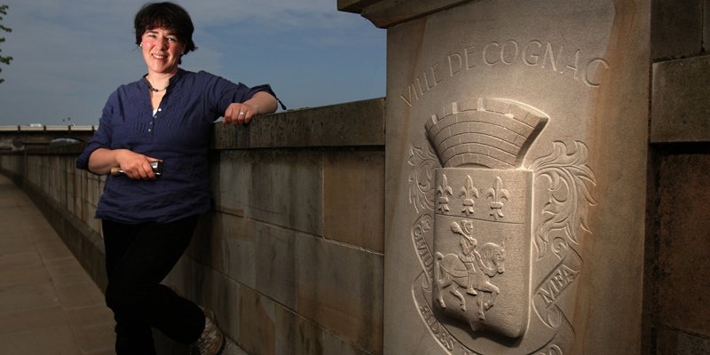 Kris Miller, Courier, 18/04/11. Picture today at Tay Street, Perth. Pic shows artist/stonecarver Gillian Forbes beside the new street sculpture she created for the waterfront, featuring the Twin town of Cognac.