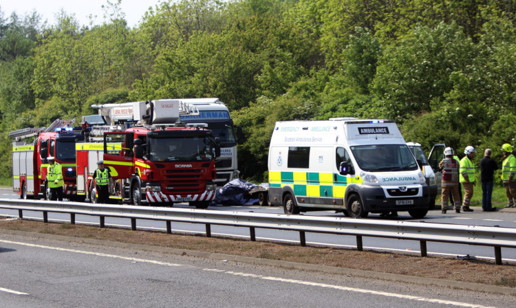 Emergency services at the scene of the tragedy on the A92 near Cowdenbeath.