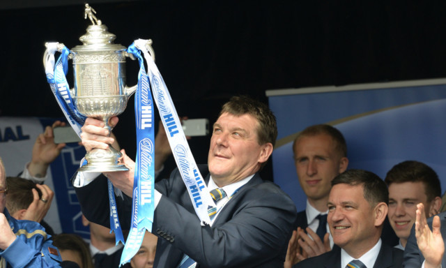 Tommy Wright shows off the Scottish Cup.