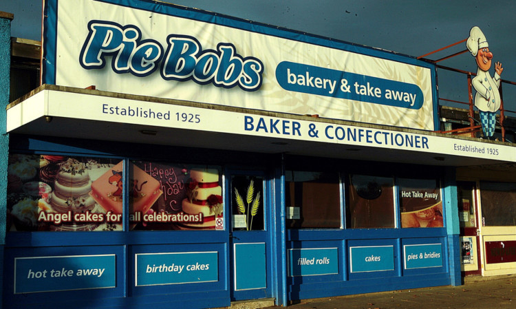 Gray smashed windows at Pie Bob's and threatened to burn the bakery down.