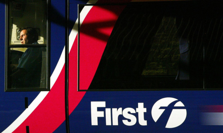 UK rail helped earnings at FirstGroup back into the black.