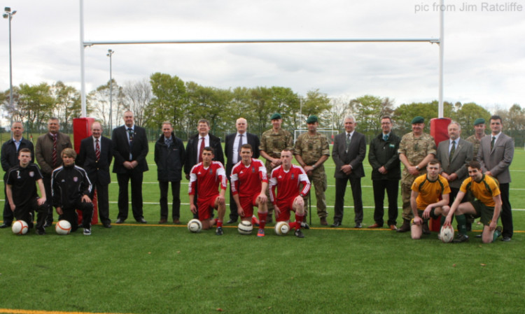 On the ball: invited guests at the official launch of the sports venue at RM Condor.