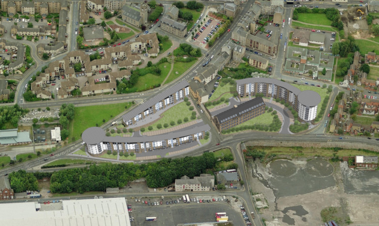 An artists impression of the old mill flanked on either side by housing.