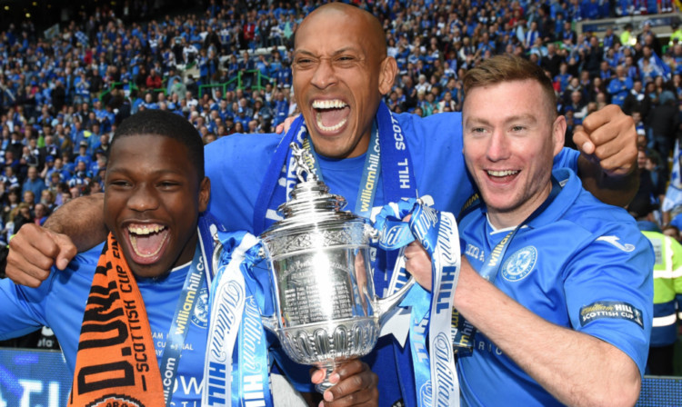 Nigel Hasselbaink, Chris Iwelumo and Paddy Cregg celebrate winning the Scottish Cup. Now they have left St Johnstone.