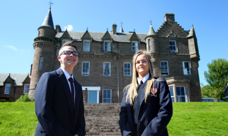 Lathallan pupils Jake Beagrie and Cara Philip outside the school and an artists impression of what the memorial would look like.