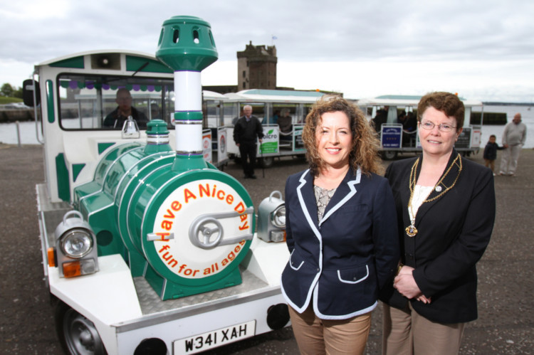Kris Miller, Courier, 24/05/14. Picture today shows the Broughty Ferry land train which was officially launched today. Pic shows Elaine Stewart - Director of Local Motion Land Trains with Depute Lord Provost Christina Roberts. The trains route starts at the Phibbies Pier then takes it along Beach Crescent, King Street and along the Esplanade to the Rock Garden with stops along the way.