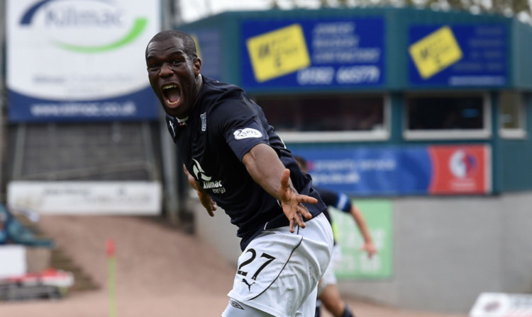 Christian Nade scored one of Dundee's goals on the final day of the 2013/14 season as the clinched the title. But away from the field, he was struggling with depression.