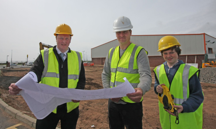 Architect Paul Fletwell, developer John Carswell and work experience pupil Conner Tait, from Arbroath High School, at the development.