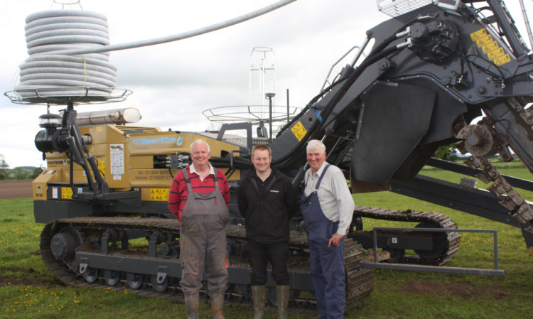 With the new machine, David Stewart, Fred Clarke, David McKerrow.