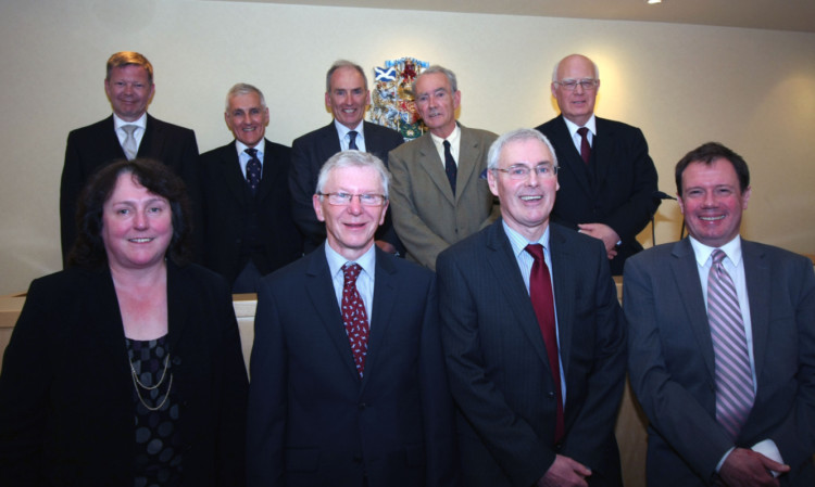 Back, from left: Sheriffs Gregor Murray, Peter Paterson, Alastair Dunlop, Norrie Stein and Kevin Veal. Front, from left: sheriff clerk Christine Petch, former sheriff clerk Stewart Munro and solicitors Hamish Watt and Steve Middleton.