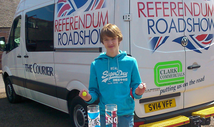 Scottish Youth Parliament member Robbie Nicoll weighs up his options at our Laurencekirk roadshow.