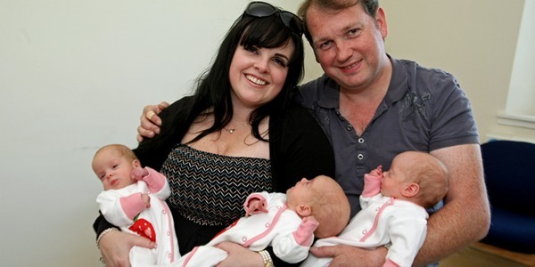 Kim Cessford, Courier, - 26.04.11 - pictured in Ninewells natal unit are the family with triplets - for a piece that Marj is doing relating to the benefits of breast feeding - pictured with mum and dad John and Taryn Pearson are babies l to r - Isla, Rose and Erin
