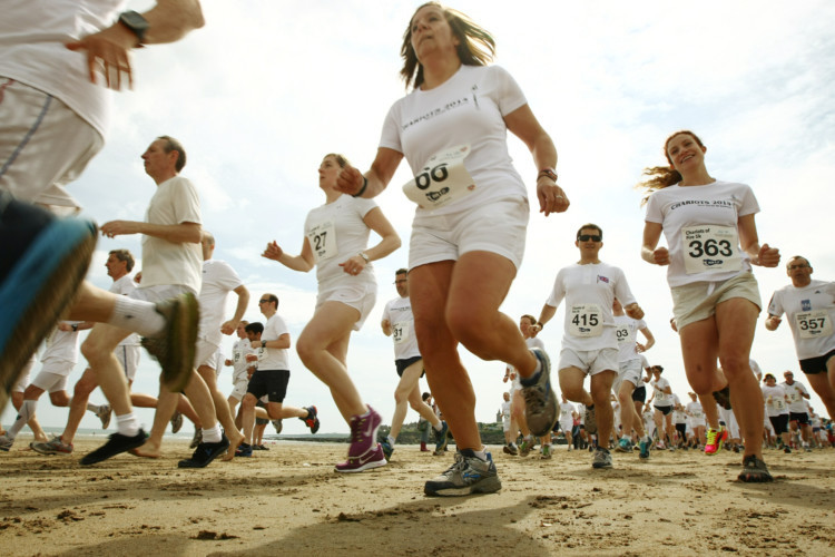 An iconic cinematic image was recreated on May 31 as athletes gathered at St Andrews West Sands for an annual fun run. The Chariots of Fire 5km saw hundreds of runners take to the beach, many choosing to sport the all-white clothing inspired by the film of the same name. The feature, now in its fourth year, has quickly established itself as one of the towns main events.