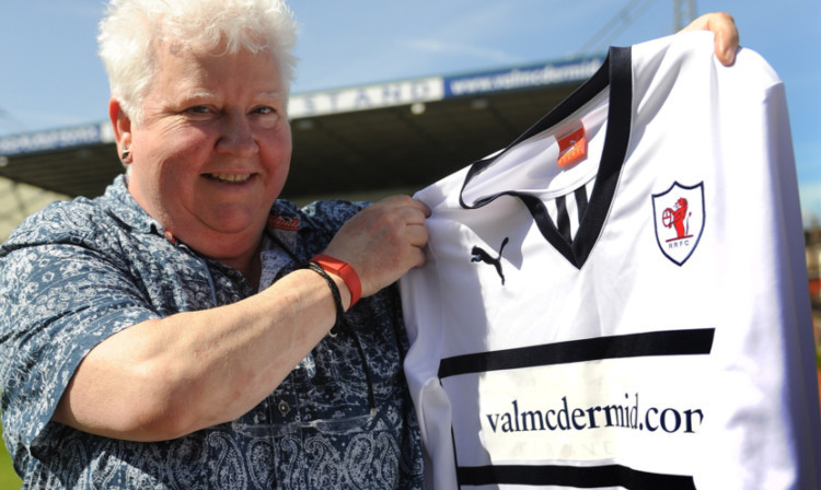 Val McDermid with one of the new shirts at Starks Park.