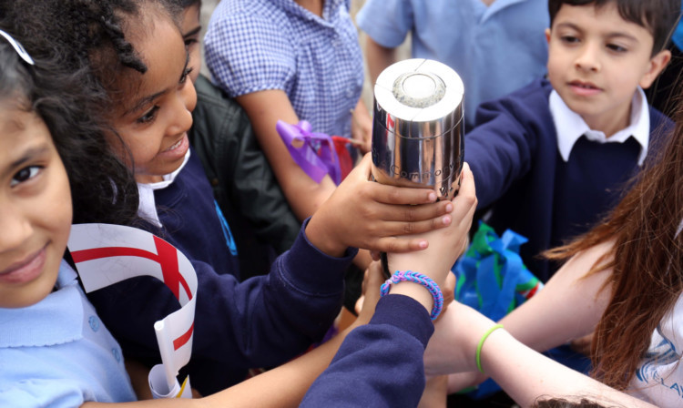 Children from St Thomas School in Birmingham are excited to have the chance to hold the Queens Baton.