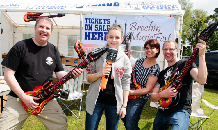 Brechin Music Fest organisers, from left, Tim Fraser, Derryn Cameron, Karen Cameron and Graeme Strachan rock on.