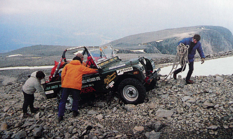 The Land Rover, which had special wheels fitted to cope with bogs had to be cajoled over some rough terrain on its way to the top.