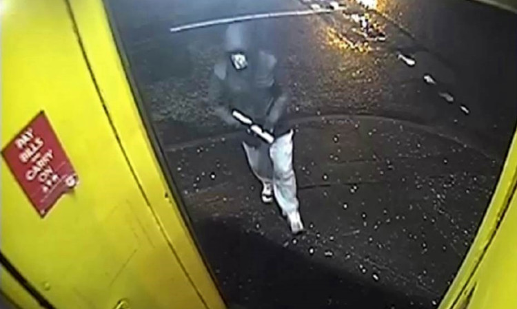 A still image from CCTV showing Liddell approaching the shop.