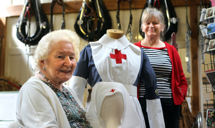 Babs Shanto at Atholl Country Life Museum with the VAD (Volunteers Aid Detachment) nurses uniform from the First World War which belonged to her mother and will be on display at the museum. She is shown with her daughter, Pamela Shanto.
