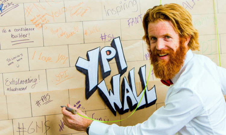 Adventurer Sean Conway at the YPI Wall, where pupils could share their experiences.