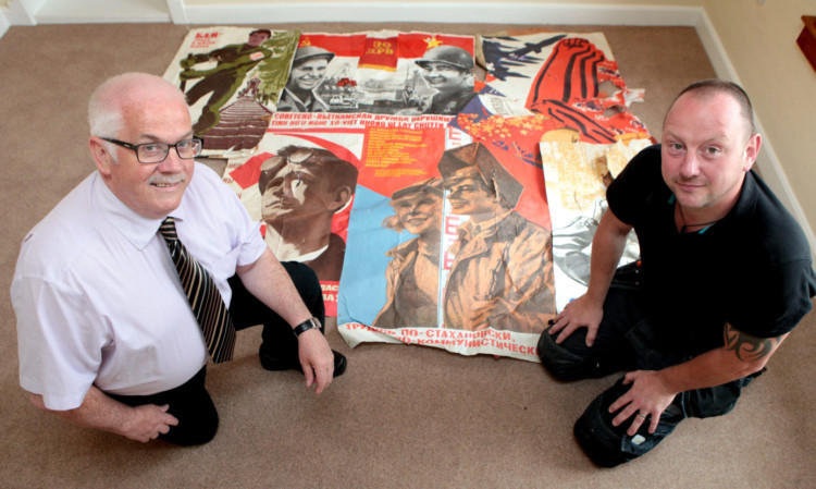 Pat Callaghan (left) found the posters with joiner Jay Davies (right).