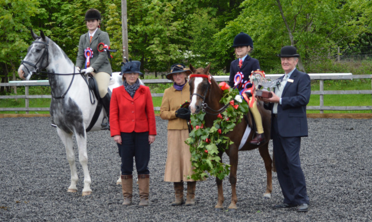 supreme champions annabelle Brooks and Bracon toy town, with reserve title holders Zoe Guild and rubix Cube (left).
