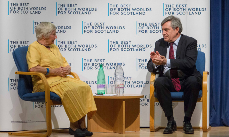 Baroness Shirley Williams and Gordon Brown on stage in St Andrews.