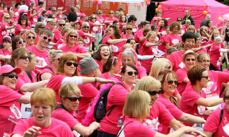 A sea of pink as the walkers warm up.