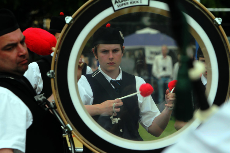 The skirl of the pipes heralded the opening of this years Cupar Highland Games on Saturday. One of the newer games on the circuit, the Cupar event in Duffus Park only began in 1979 but is now recognised as a major event in the calendar. Crowds from across Scotland watched a flag being hoisted in memory of the late council park keeper Bert Patrick, who was instrumental in the preparation of the park for the games for many years.