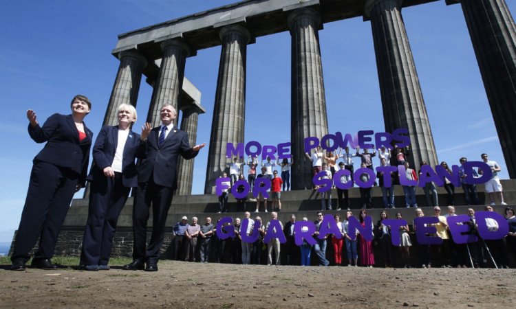 Scottish party leaders Ruth Davidson, Johann Lamont and Willie Rennie have pledged more powers for Holyrood in the event of a No vote.