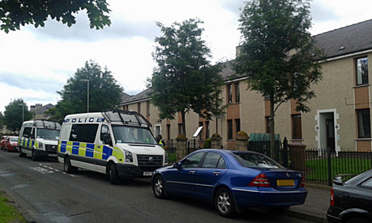 Officers raided the flat on Kingsway East on Tuesday morning.