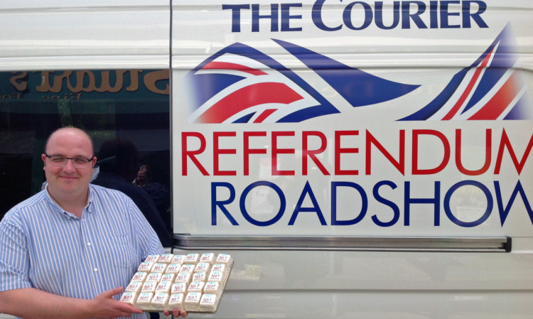 Keith Stuart, of Stuarts of Buckhaven bakery, serves up some referendum-themed cakes.