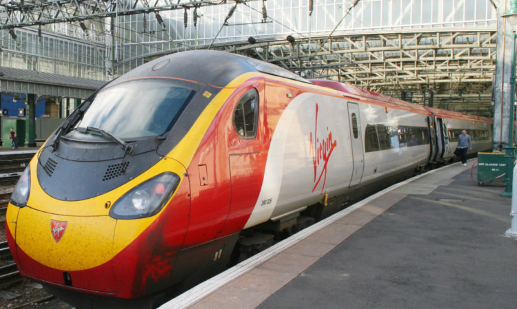 A Virgin Pendolino train in Glasgow Central Station.