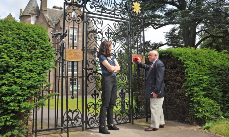 Major Ronnie Proctor and the CEO of the Black Watch museum, Kathryn Howell, at the Wavell Gate.