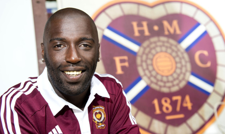 Former Dundee United star Morgaro Gomis is Hearts newest signing.