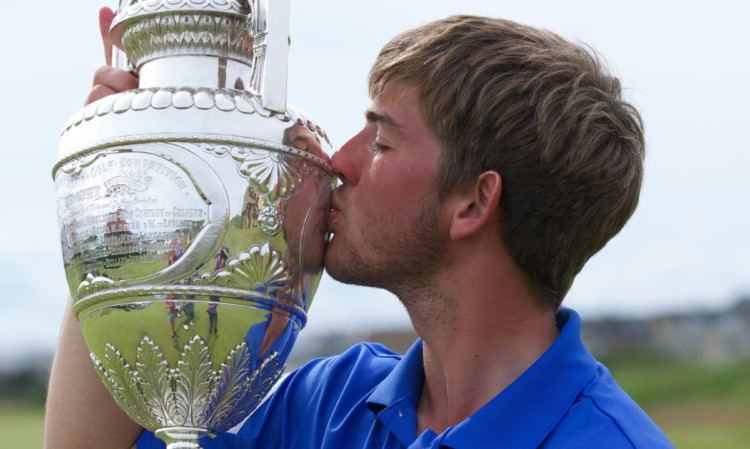 Bradley Neil with the Amateur Championship trophy.