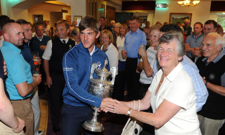 Bradley Neil arrives to a hero's welcome at Blairgowrie Golf Club after becoming Amateur champion.