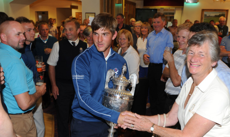 Bradley Neil returned to a hero's welcome at Blairgowrie Golf Club.