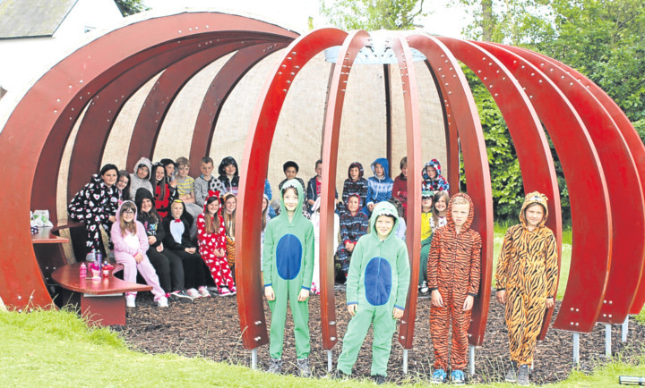 The outdoor classroom can be adapted to all kinds of uses, including fundraising onesie days!