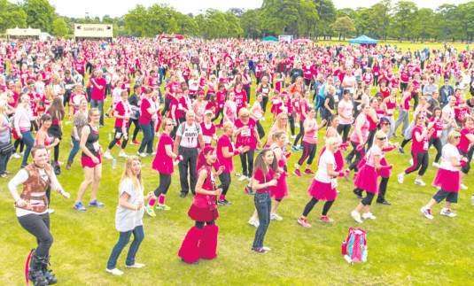 The thousands of runners at Beveridge Park had a mass warm-up session before setting off on the race.