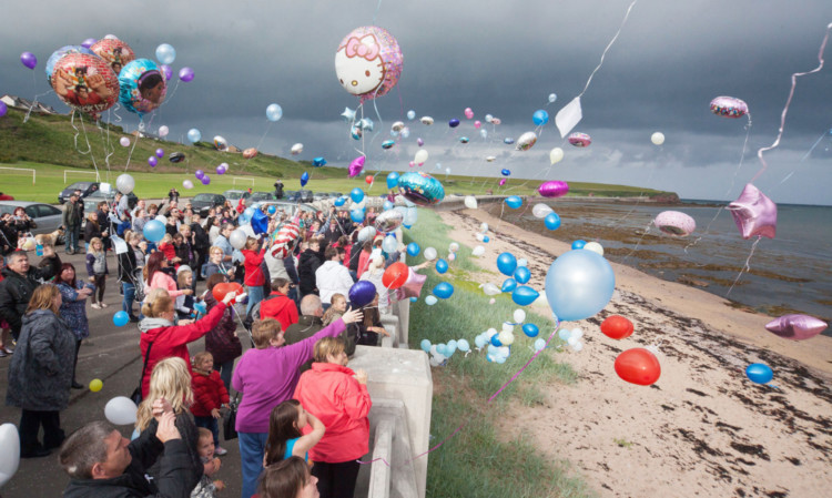 Balloons launched at Arbroath's Victoria Park on Saturday with messages for Cally Simpson.