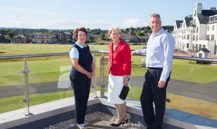 Golf course celebrates as hard work pays off.