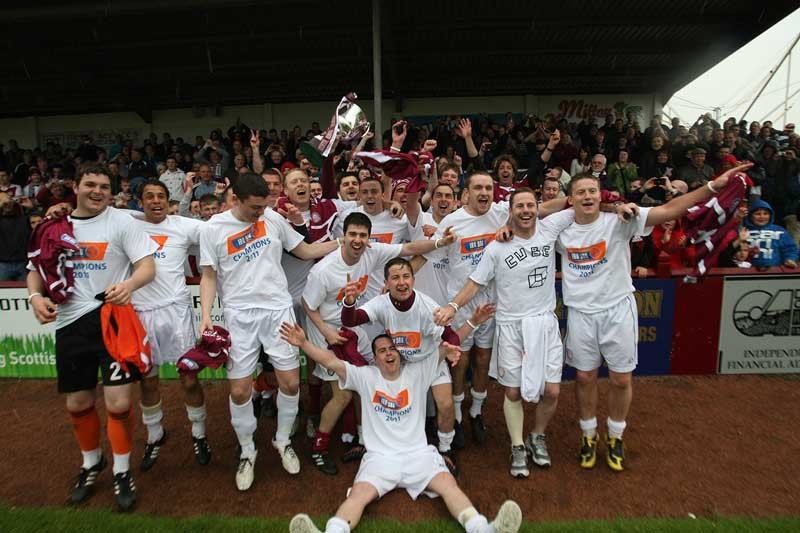 Kim Cessford, Courier - 07.05.11 -Arbroath FC v Elkgin City FC at Gayfield - pictured are the team celebrating lifting the third division trophy with fans