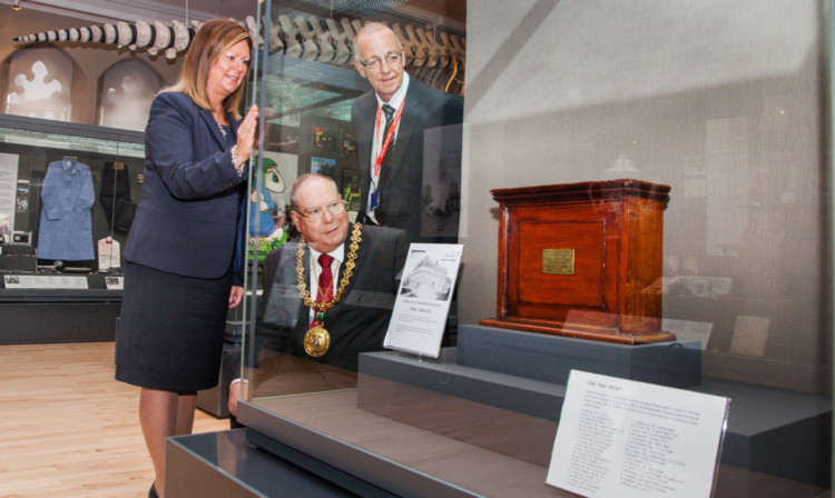 Linda Bonar and Ricky Turner after handing over the time capsule to Lord Provost Bob Duncan.