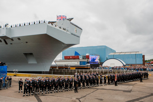 The Royal Navys new aircraft carrier has been officially named by the Queen. Crowds gathered at Rosyth Dockyard to see the HMS Queen Elizabeth being officially christened by Her Majesty.
