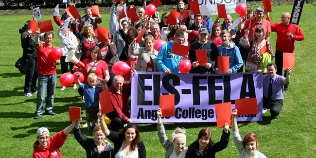 Kim Cessford, Courier 10.05.11 - staff and students at Angus College, Arbroath held a demonstration against proposed budget cuts  - pictured are the demonstrators showing the cuts the red card