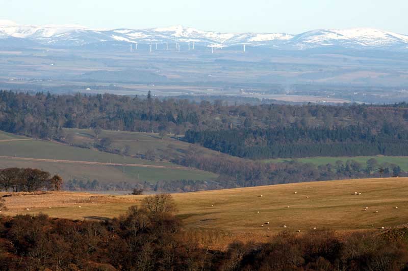 B934, Dunning Glen, between Dunning and Upper Yetts. Scenic shot, looking North East towards the Grampian Mountains (with possibly the Drumderg Wind farm in background?).